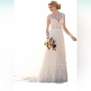 Wedding dress, never worn and no alterations done!